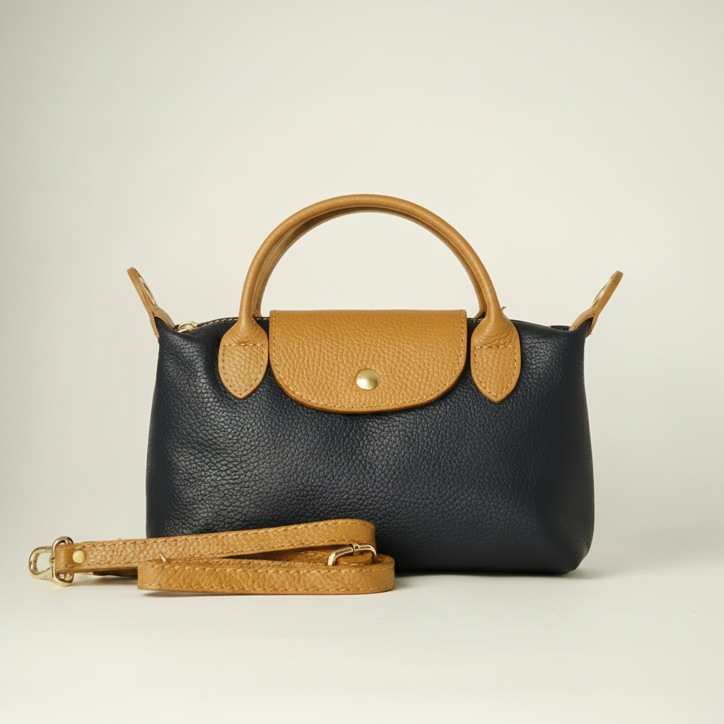 Bolso de mano de cuero azul marino con detalles marrones