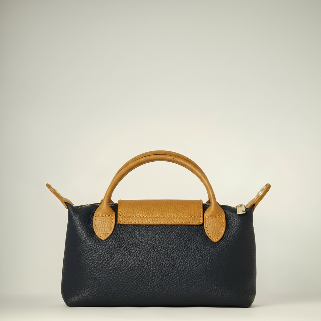 Bolso de mano de cuero azul marino con detalles marrones