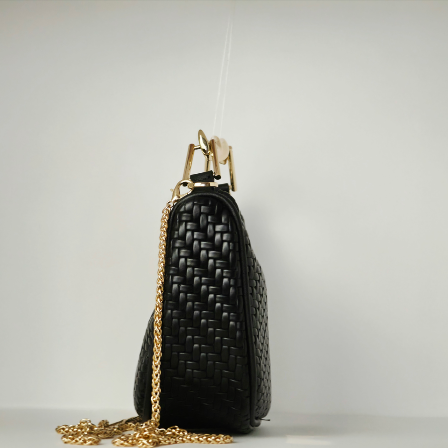 Bolso de mano con efecto piel trenzada en material sintético