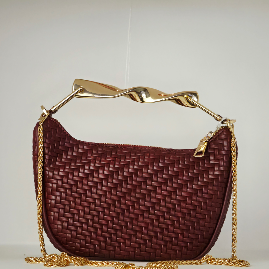 Bolso de mano con efecto piel trenzada en material sintético