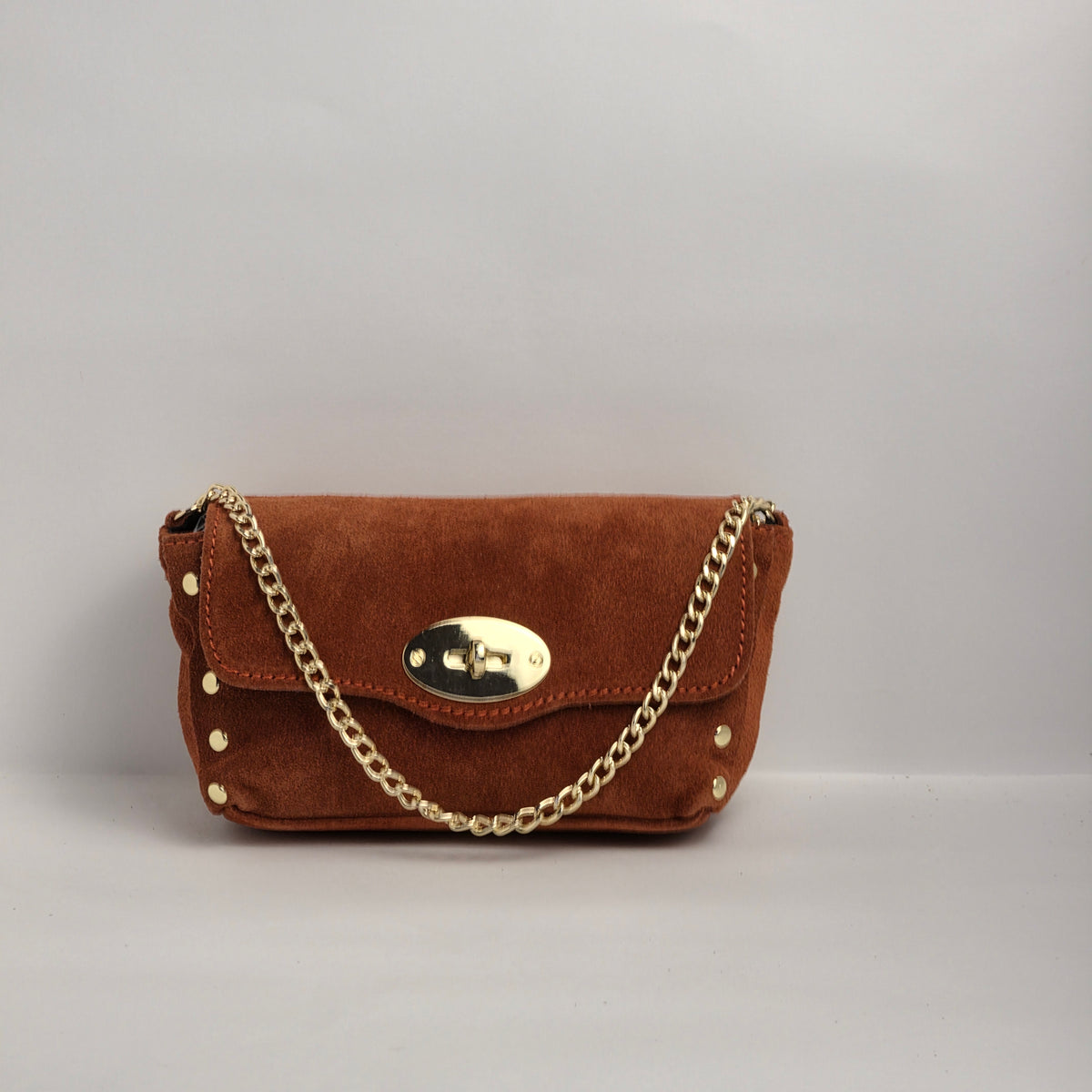 Mini bolso en piel de ante naranja oscuro