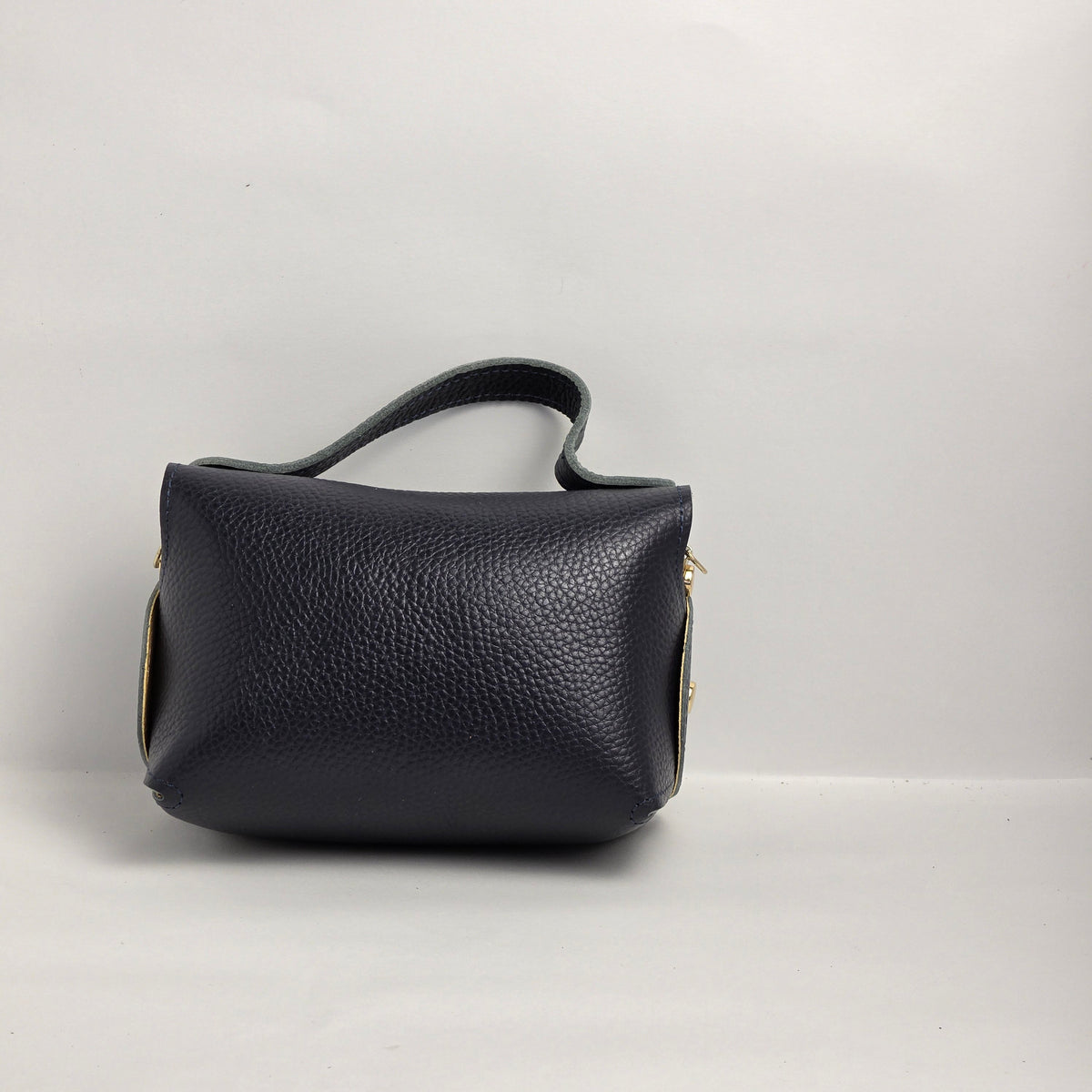 Mini bolso de mano en piel azul marino
