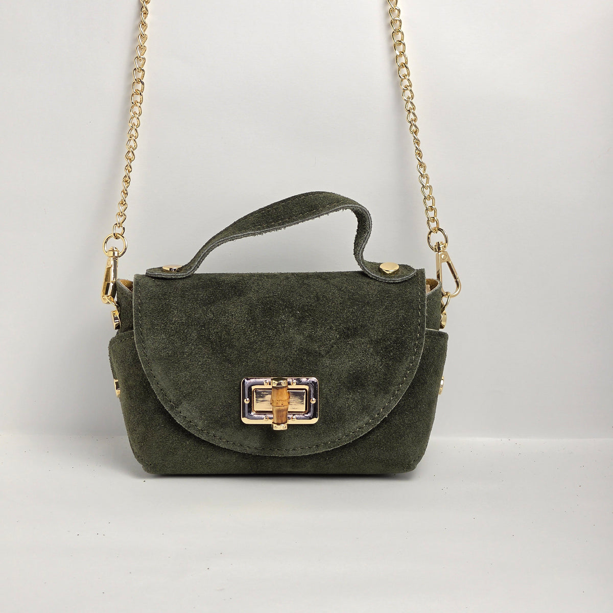 Mini bolso de mano en piel de ante verde oliva