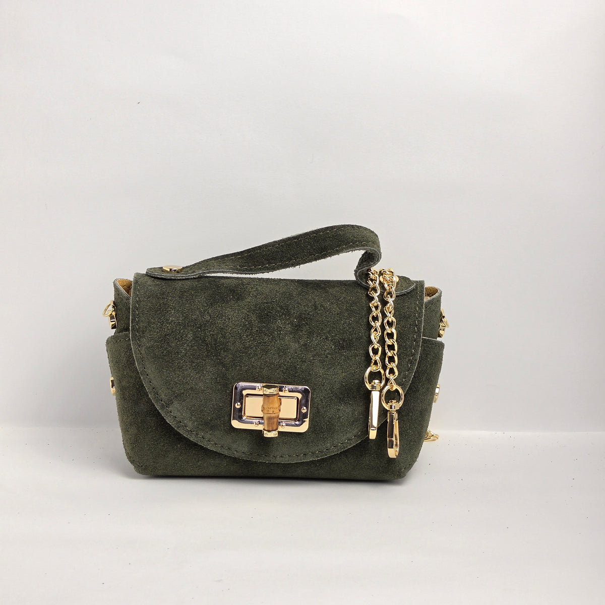 Mini bolso de mano en piel de ante verde oliva